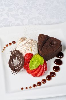 Chocolate flan with strawberries and chocolate, a wonderful dessert