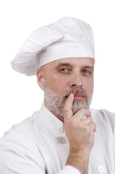 Portrait of a thinking chef on white.
