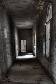 Dark and spooky corridor in an old abandoned building