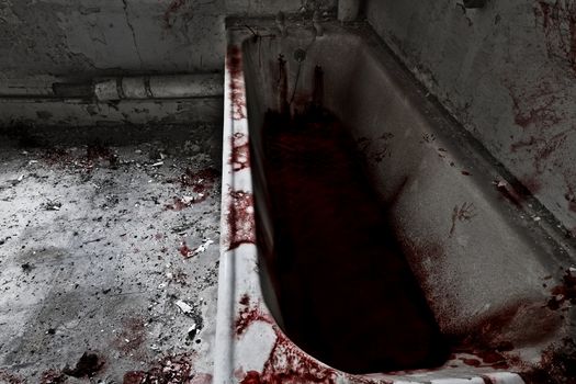 Old bathroom with bath full of blood and blood spatter everywhere