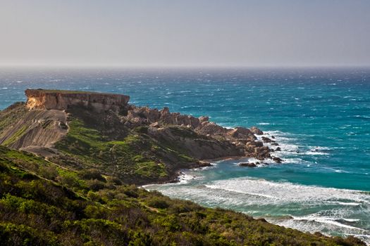 Ghajn Tuffieha Bay is one of the most beautiful and idyllic beaches on the island of Malta,surrounded by unique scenery and within an area of high ecological importance