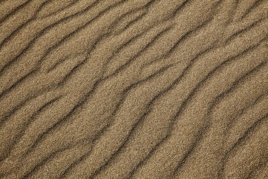 Abstract image showing light and shadow areas in sand dune detail