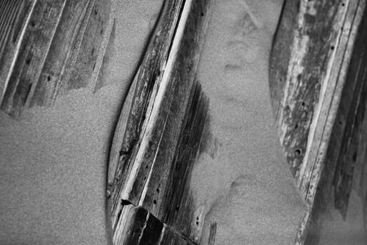 Abstract image showing high grain wood in sand