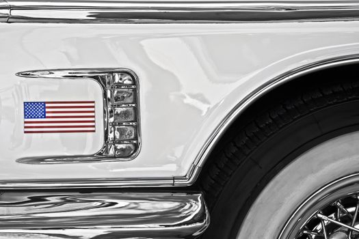 Star Spangled Banner on the fender of a classic American car
