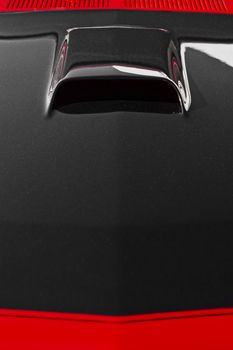 Abstract detail from the bonnet of an American muscle car