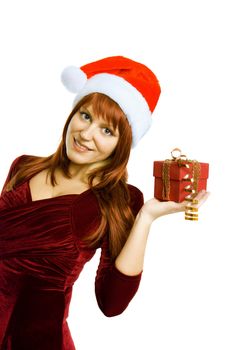admiring a girl in a Christmas hat holding a New Year gift
