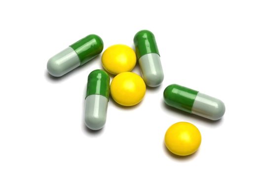 Some pills on white background