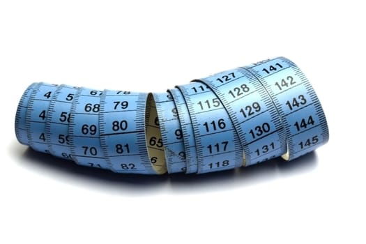 Tape measure on white background