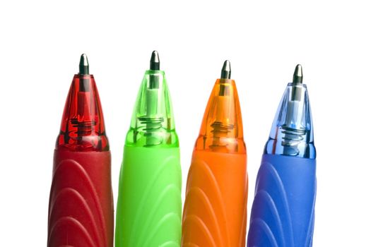 Four colour pens isolated on white background