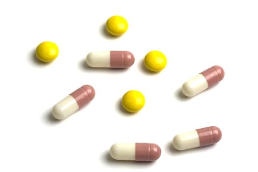 Colourful pills isolated on white background