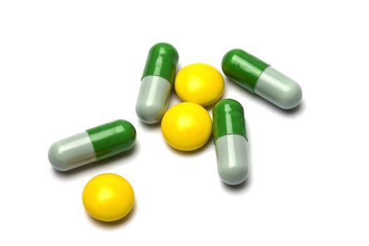 Some pills on white background