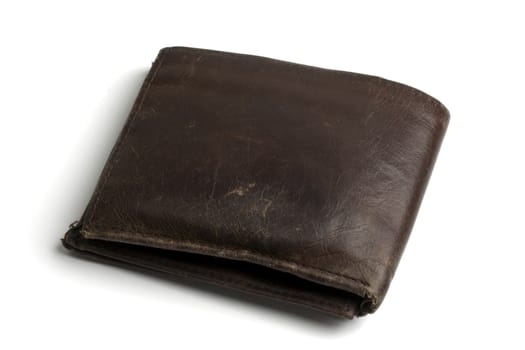 Old brown wallet isolated on white
