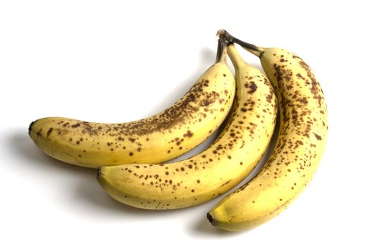 three spoiled bananas isolated on white background