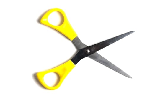 Yellow handled scissors isolated on a white background