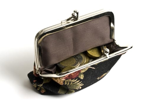 Pretty purse with coins isolated on white background