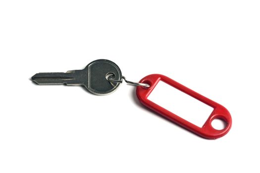 Blank tag and a key isolated on white 
