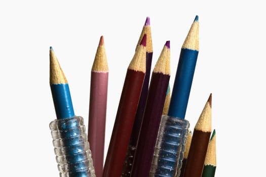 colorful pencils on focus isolated on white
