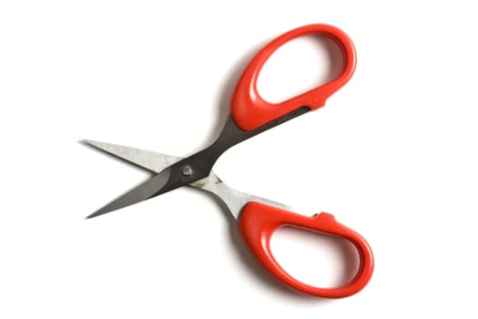 Red scissors isolated on white background