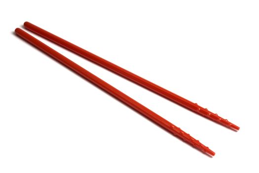 Red chopsticks isolated on white background 
