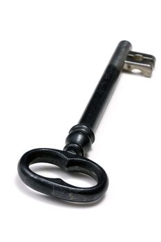 A black Old key isolated on white background