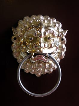 Chinese antique door knob with lion/dragon head 
