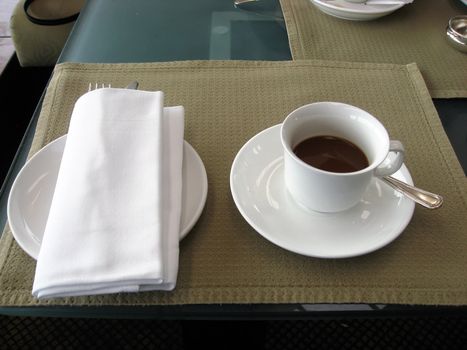 Serving coffee closeup in the lobby of a hotel