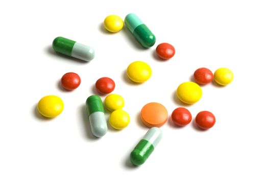 Colourful pills isolated on white background