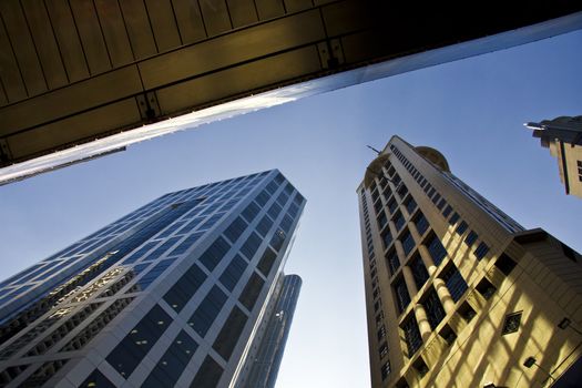 Look up at skyscrapers of Hong Kong in sunshine