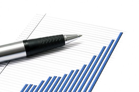 Business graph and a pen
