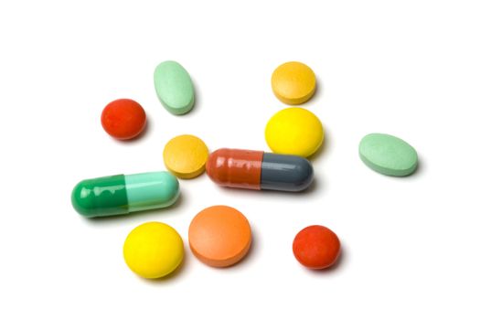 Colorful pills isolated on white background