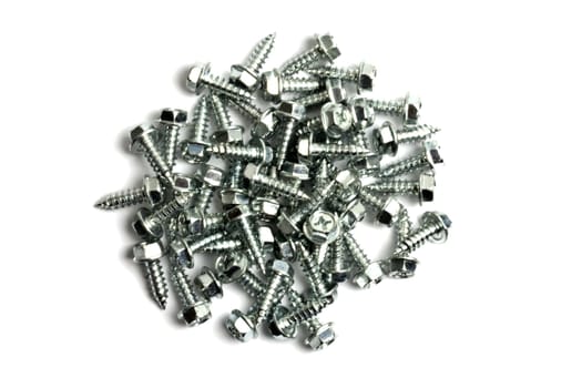 Heap of short screws isolated on white background