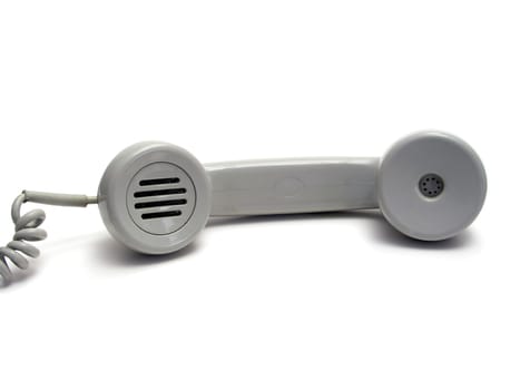 Old gray telephone receiver isolatd on white background