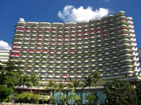 Hotel building in Bangkok. Nice balcony composed by beautiful flowers. 