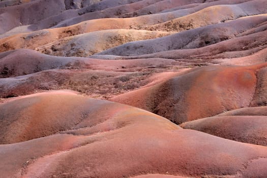 Seven colored earth background closeup ,Mauritius