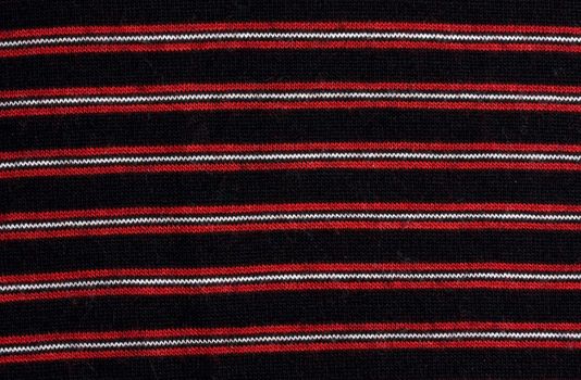Horizontal strips pattern fabric background ,Red and black.