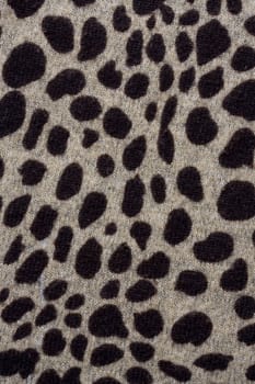 Brown leopardskin Pattern fabric background 
