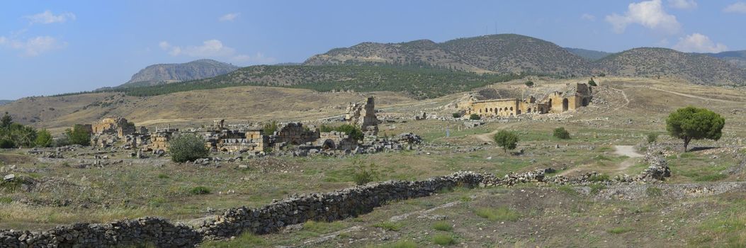 Pamukkale. Turkey. Hierapolis Amphitheatre. Panoramic against blue sky