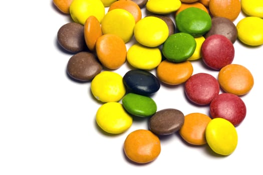 Multi colored Chocolates close-up on white background