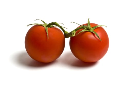 Fresh two tomatoes isolated on white background