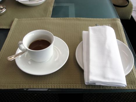 Serving coffee closeup in the lobby of a hotel
