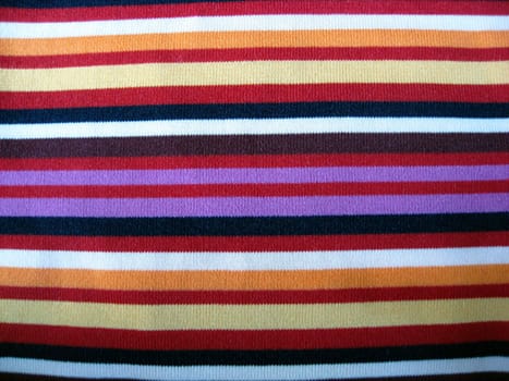 Colorful striped cotton fabric background 

