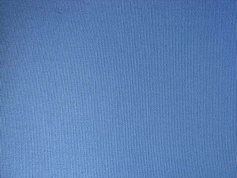 Texture of blue fabric background closeup