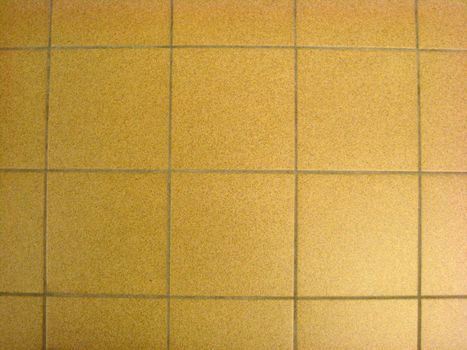 Texture of yellow stone floor background closeup