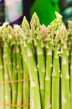 Image of a close-up of asparagus stalks in market