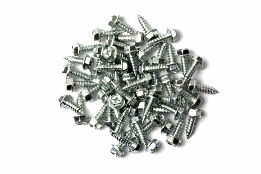 Heap of short screws isolated on white background