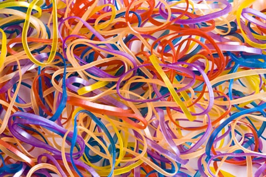 Colorful rubber bands background closeup