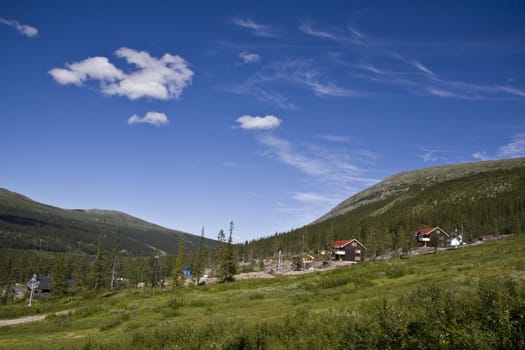 Landscape of green mountain and blue sky