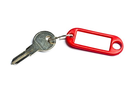 Blank tag and a key isolated on white background
