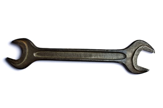 An old wrench isolated on white background