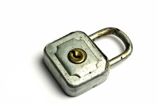 Old padlock isolated on white background